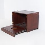 Vintage bar cabinet with brass markings