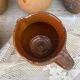set of terracotta jugs country style