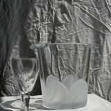 Glass ice or champagne bucket with stylized petal patterns