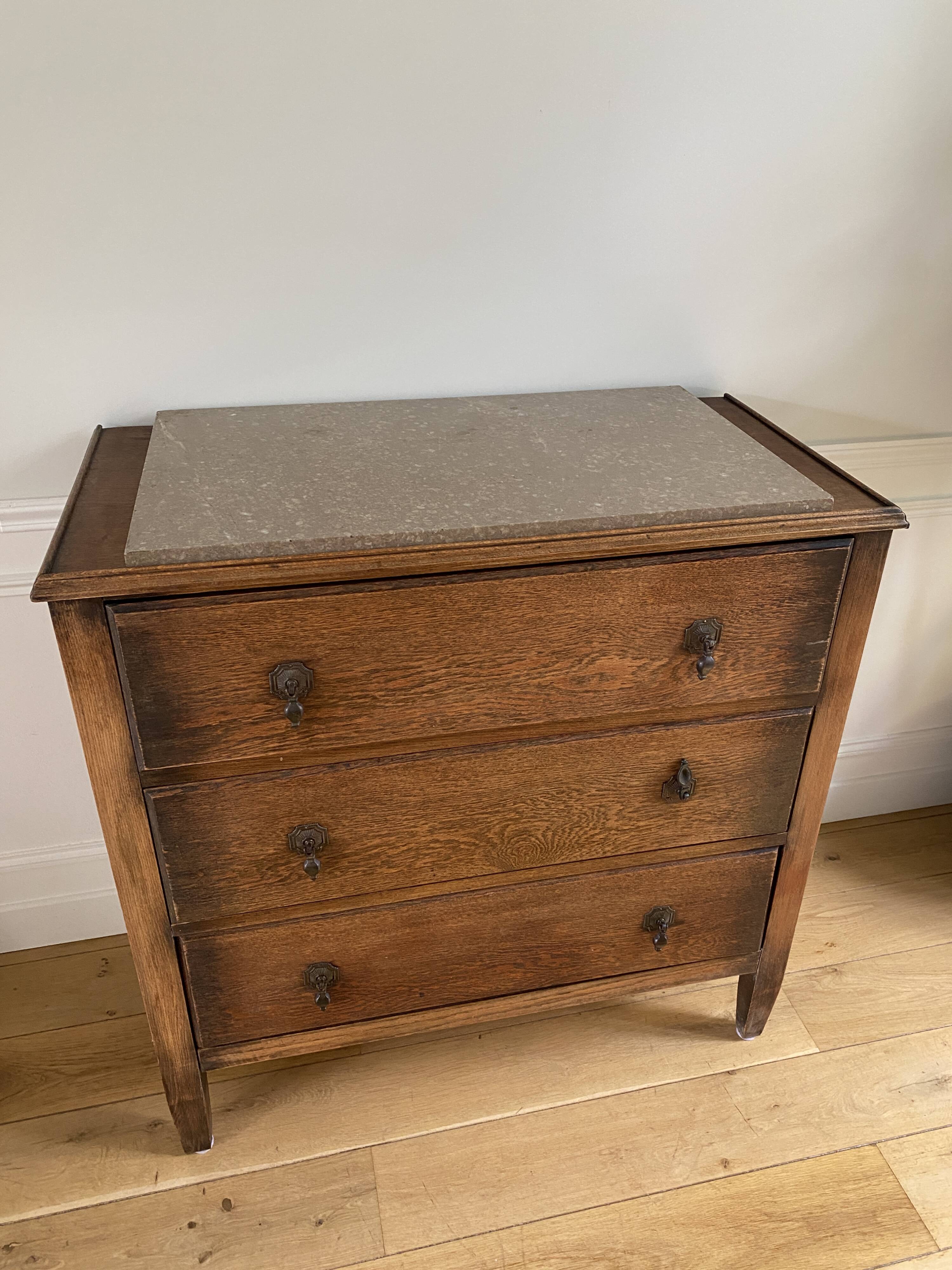Vintage wooden chest of drawers with three drawers and brown marble top