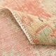 Tapis vintage oriental rouge et saumon