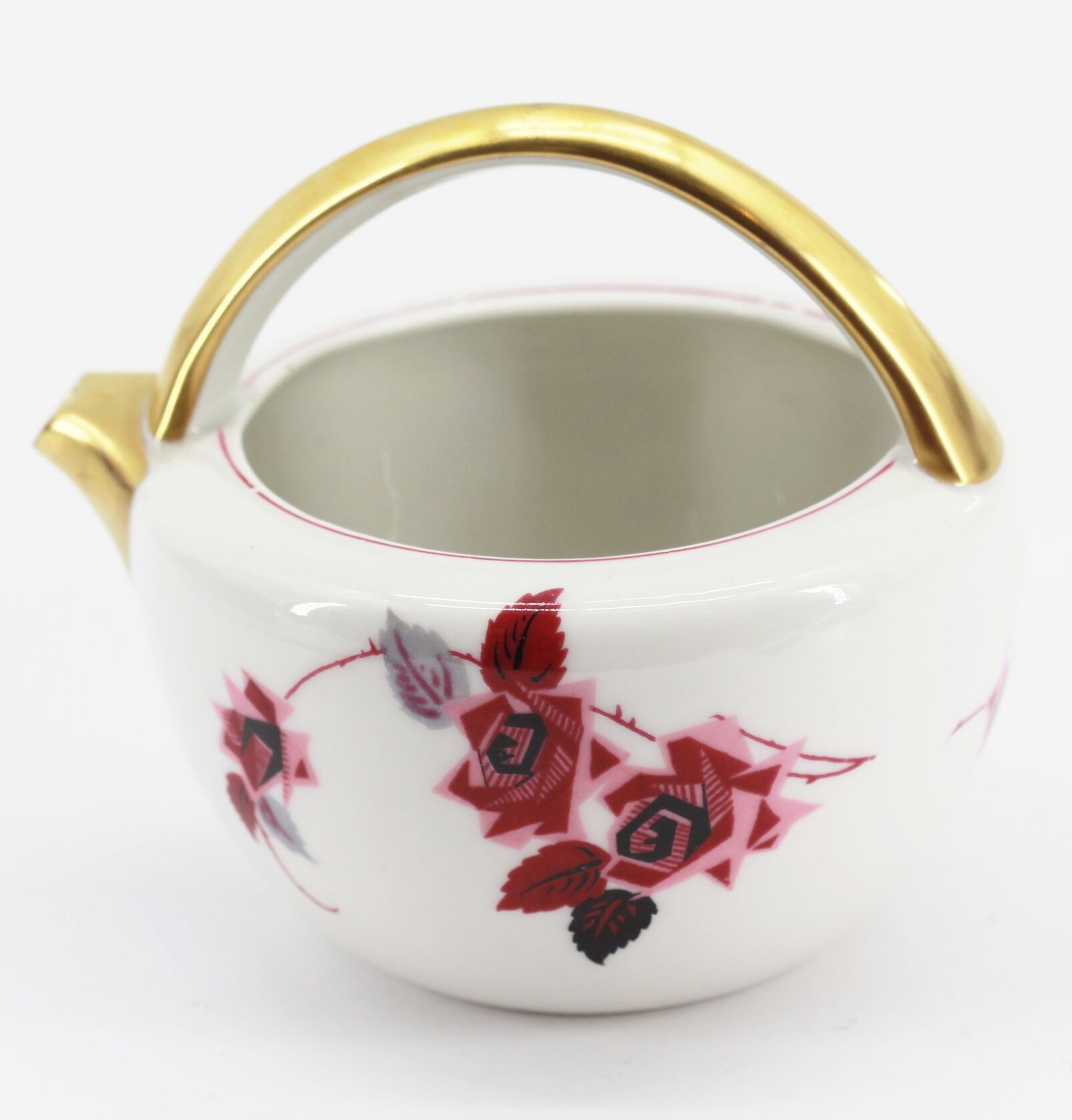 Antique porcelain teapot pourer