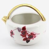 Antique porcelain teapot pourer