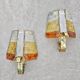 Brutalist pair of wall sconces in hammered glass by Longobard 1970.