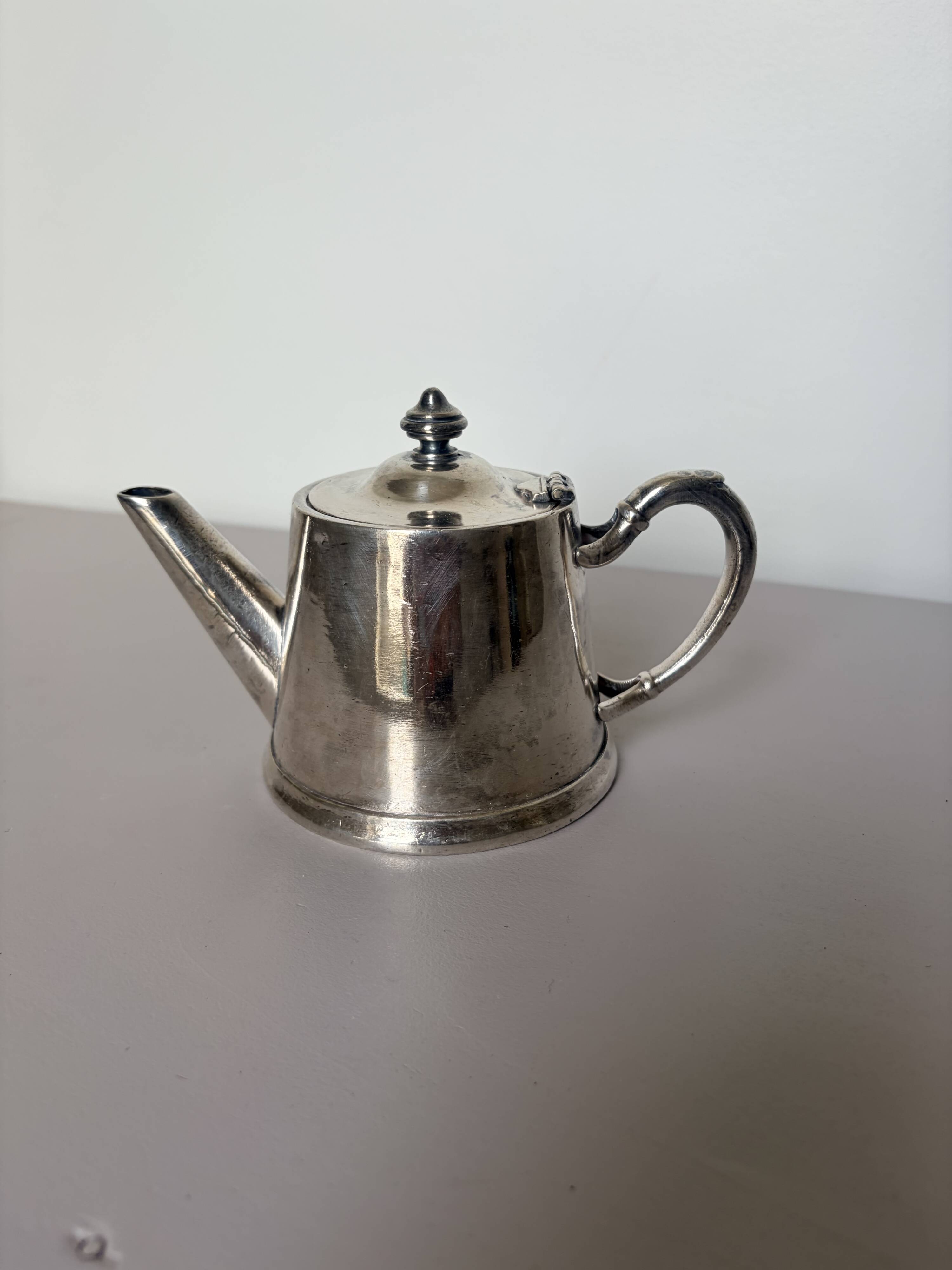 Silver-plated metal teapot vintage potter 240546