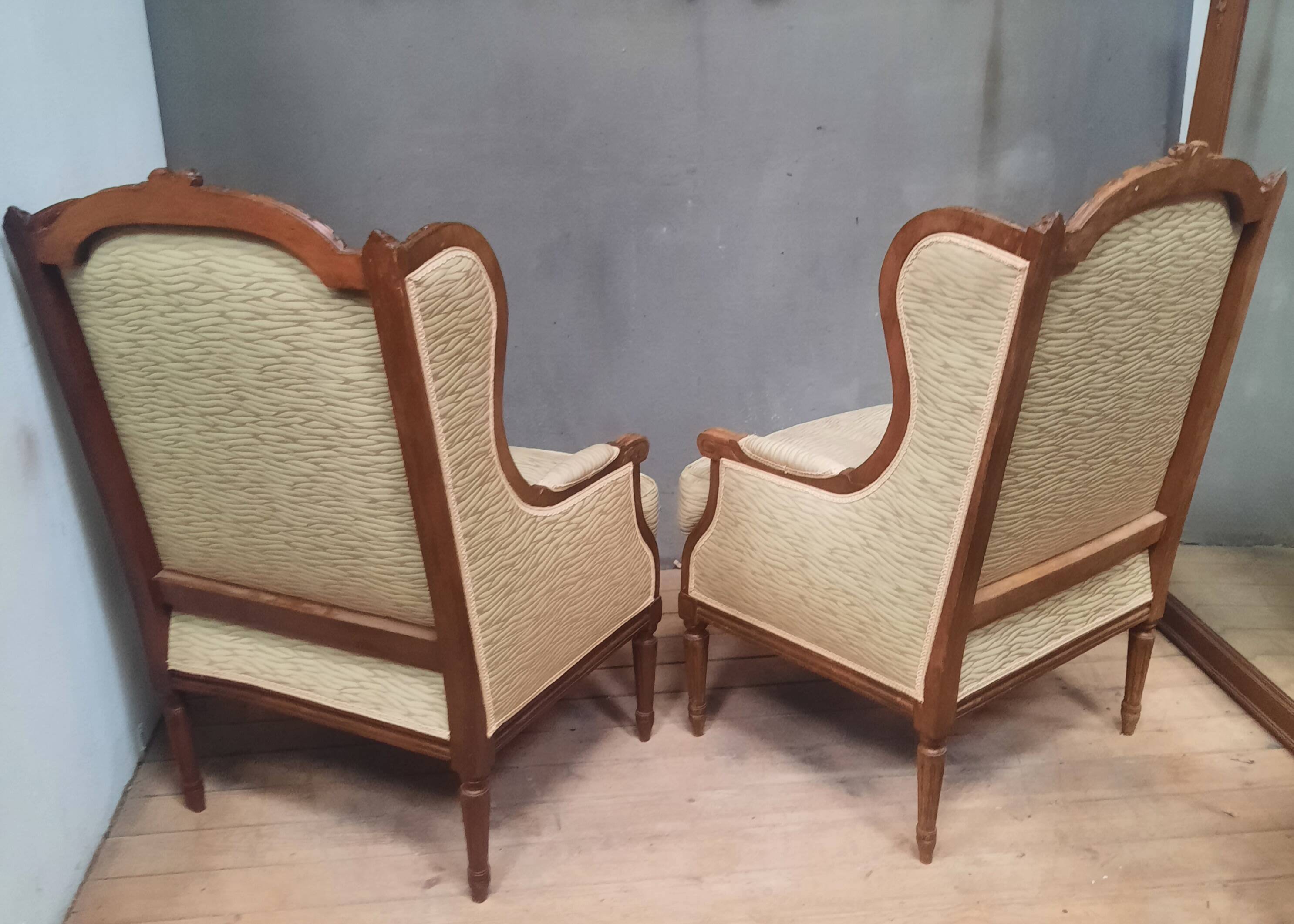 Pair of wingback armchairs in Louis XVI style