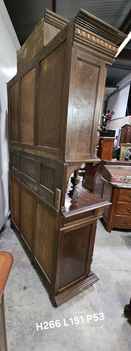 Important two-body buffet in solid walnut, richly carved in pure Renaissance style.