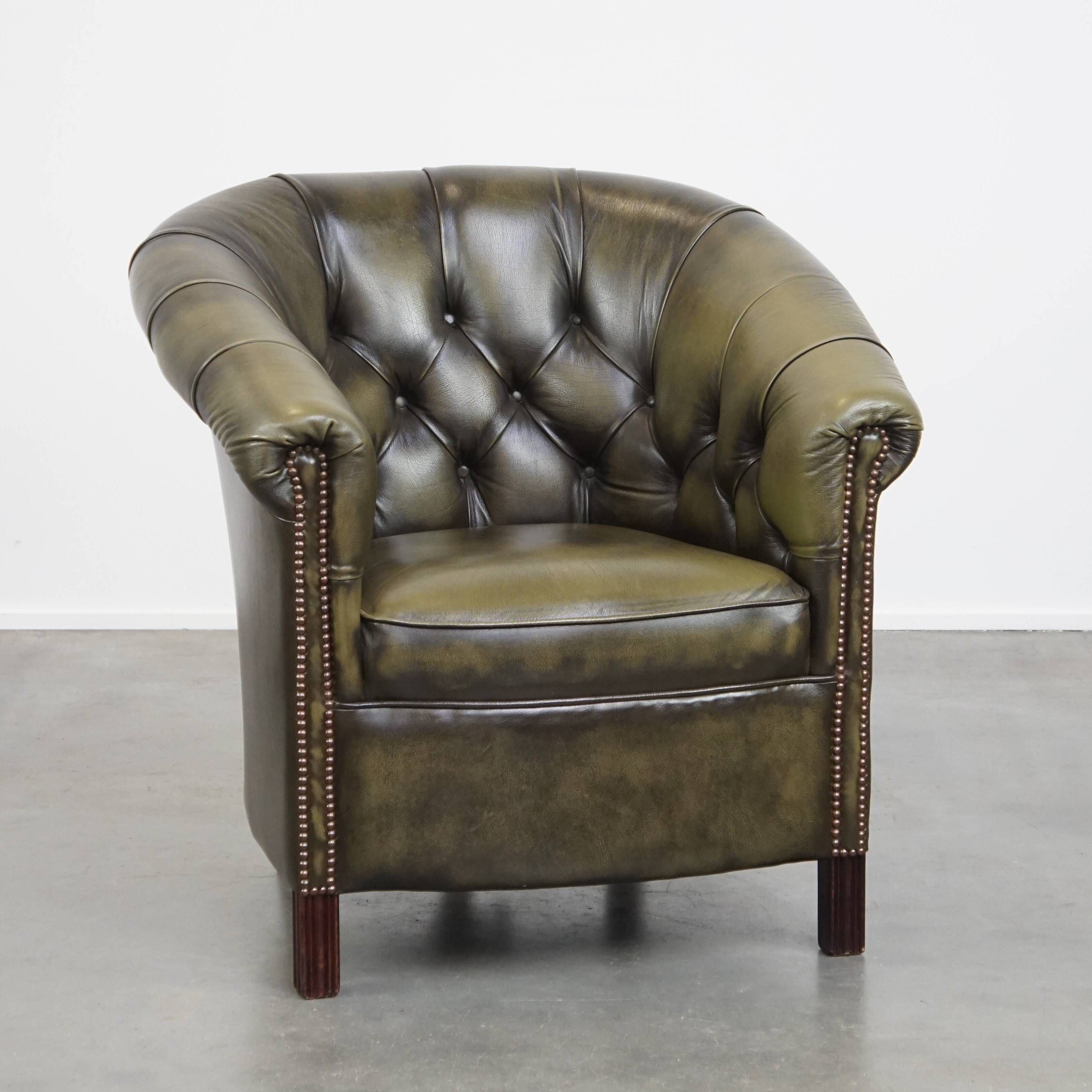 English Chesterfield club chair in olive green cowhide leather