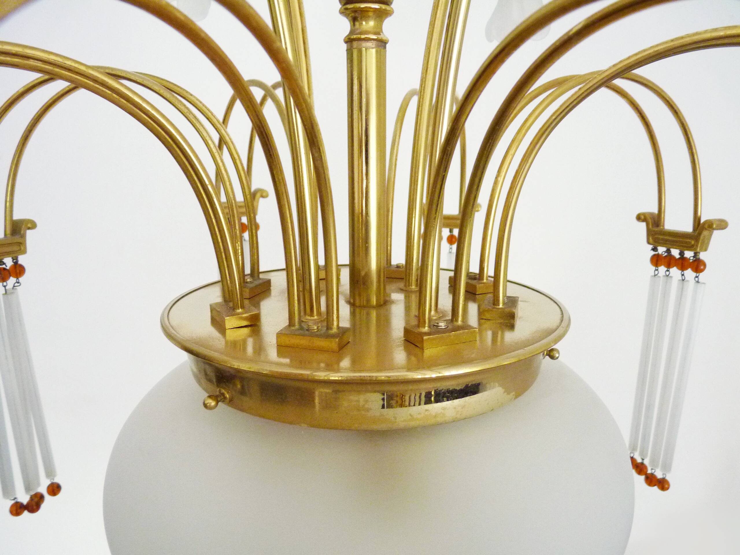 Art Nouveau style chandelier in brass with pendants and glass globe with 3 lights. Italy 70s 80s