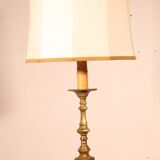 bronze candlestick from the 18th century converted into a lamp with its shade