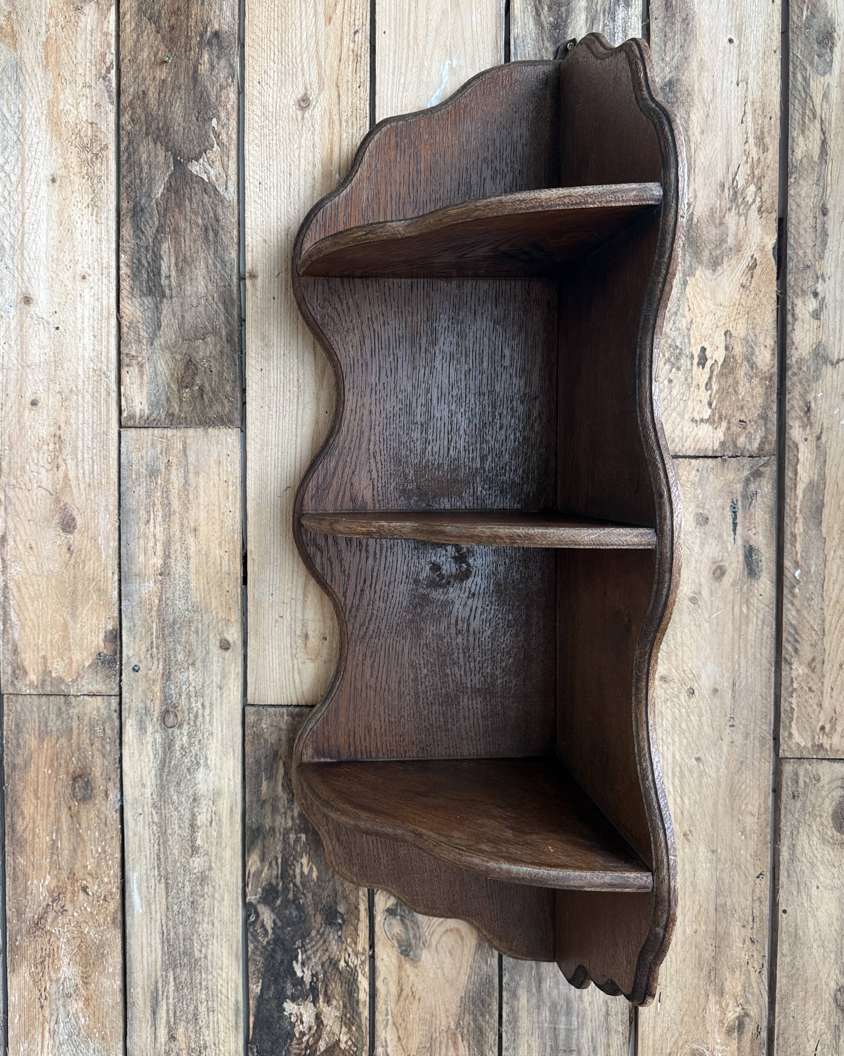 Old corner shelf in solid oak