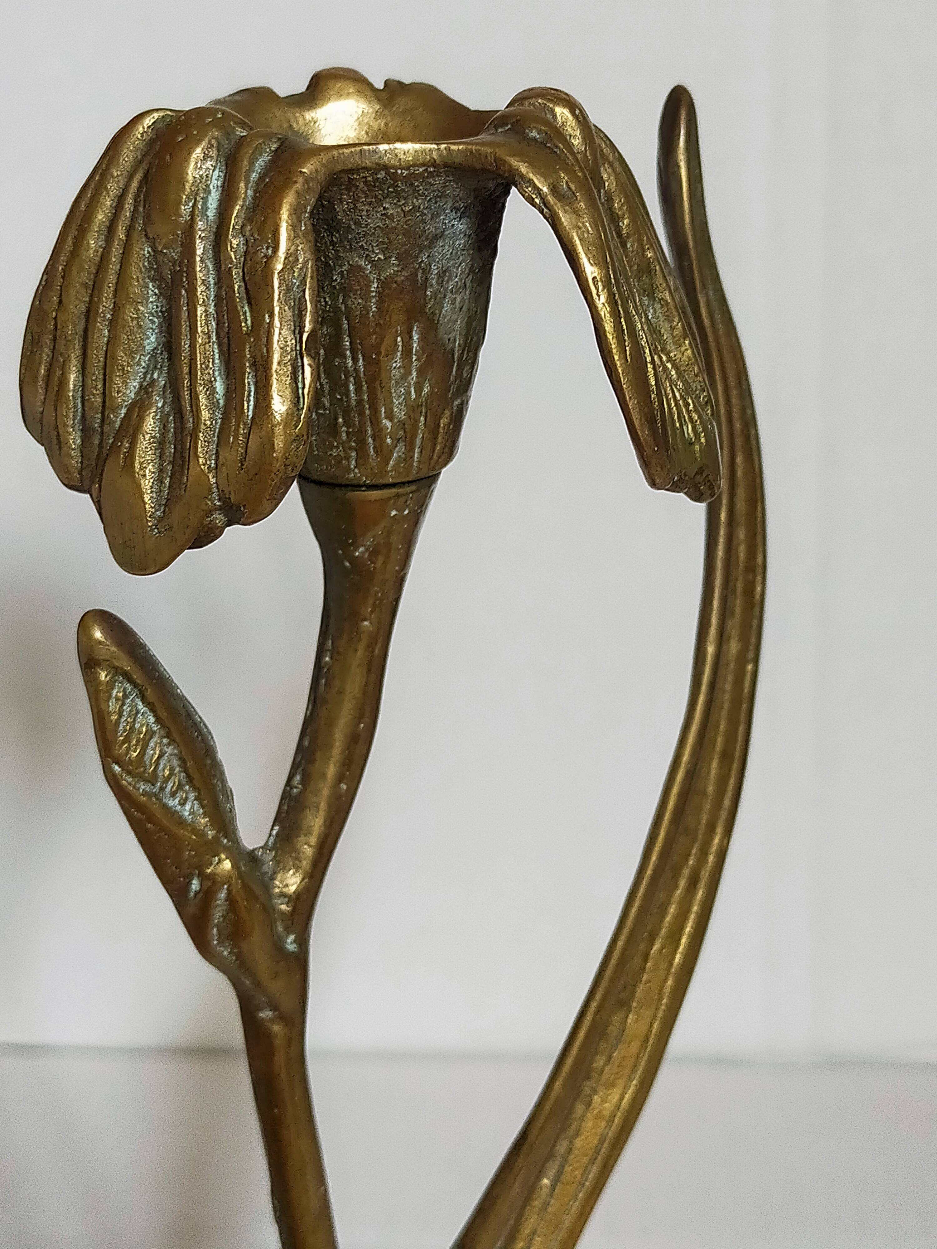 Old iris flower candle holder in solid brass