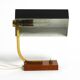 Beautiful small Mid Century Modern metal and brass table lamp with teak bas