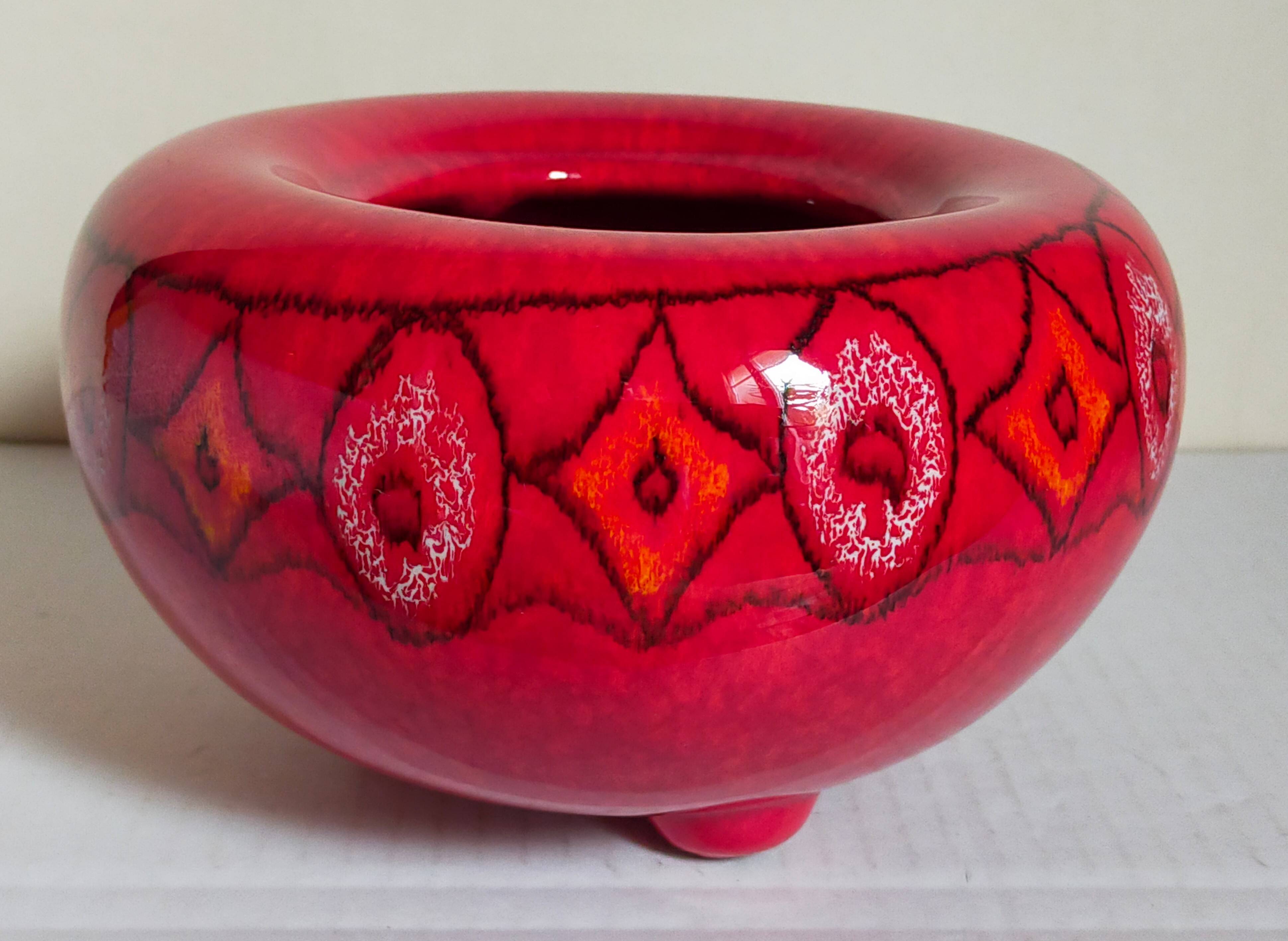 Vintage bright red enamel ceramic tripod vase