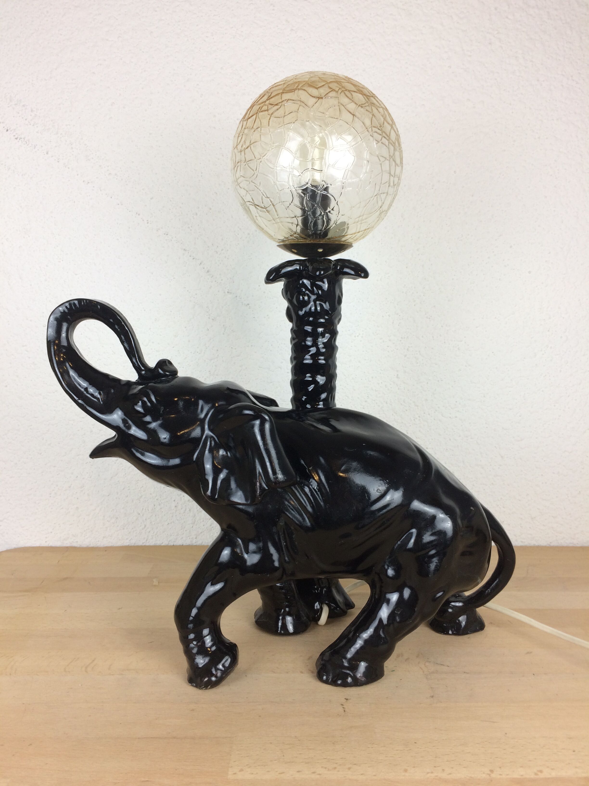 Elephant lamp and palm tree in black resin