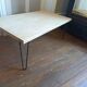 Coffee table in solid bamboo with steel legs.