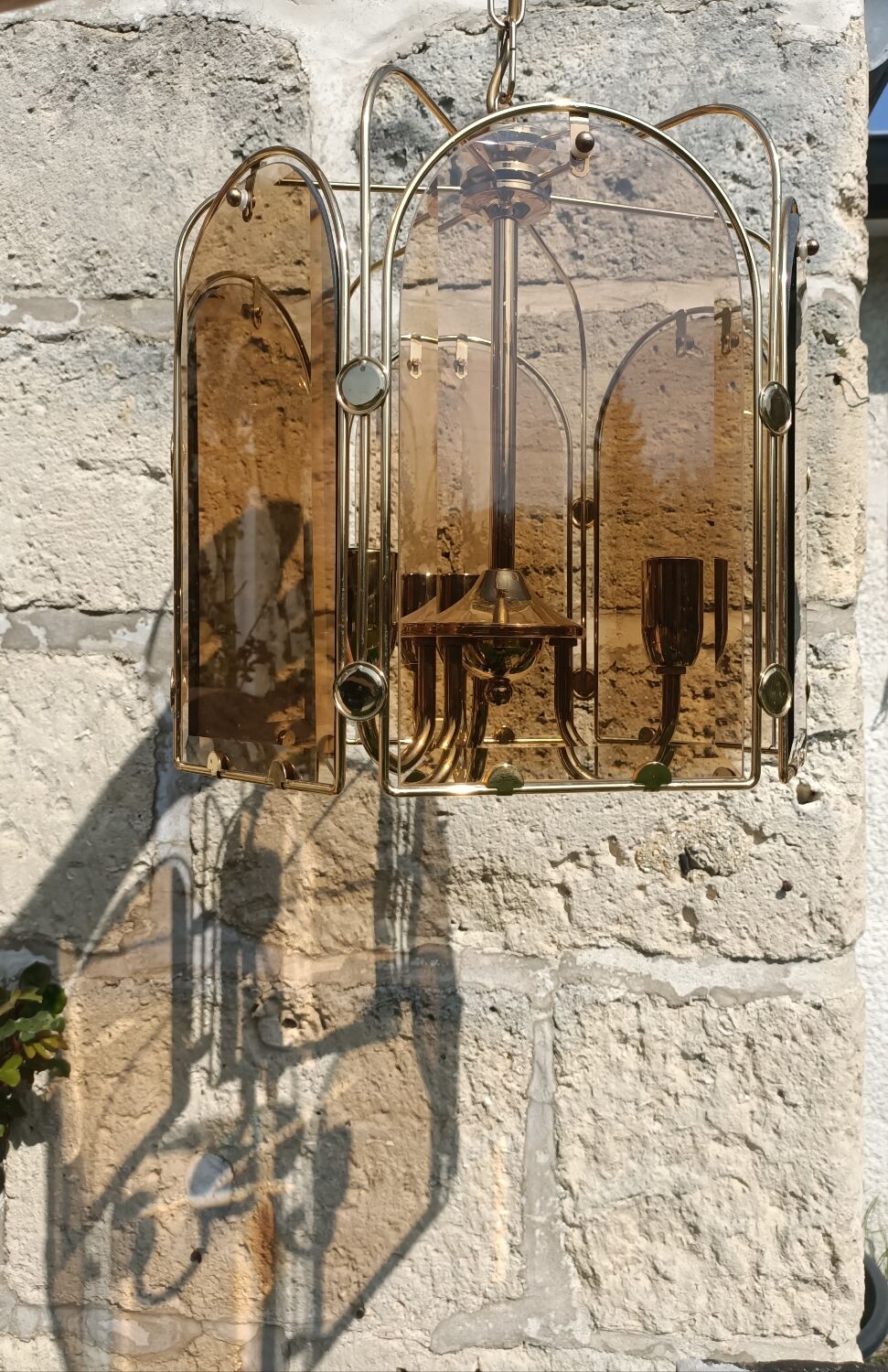 Gilded brass and smoked glass luminaire