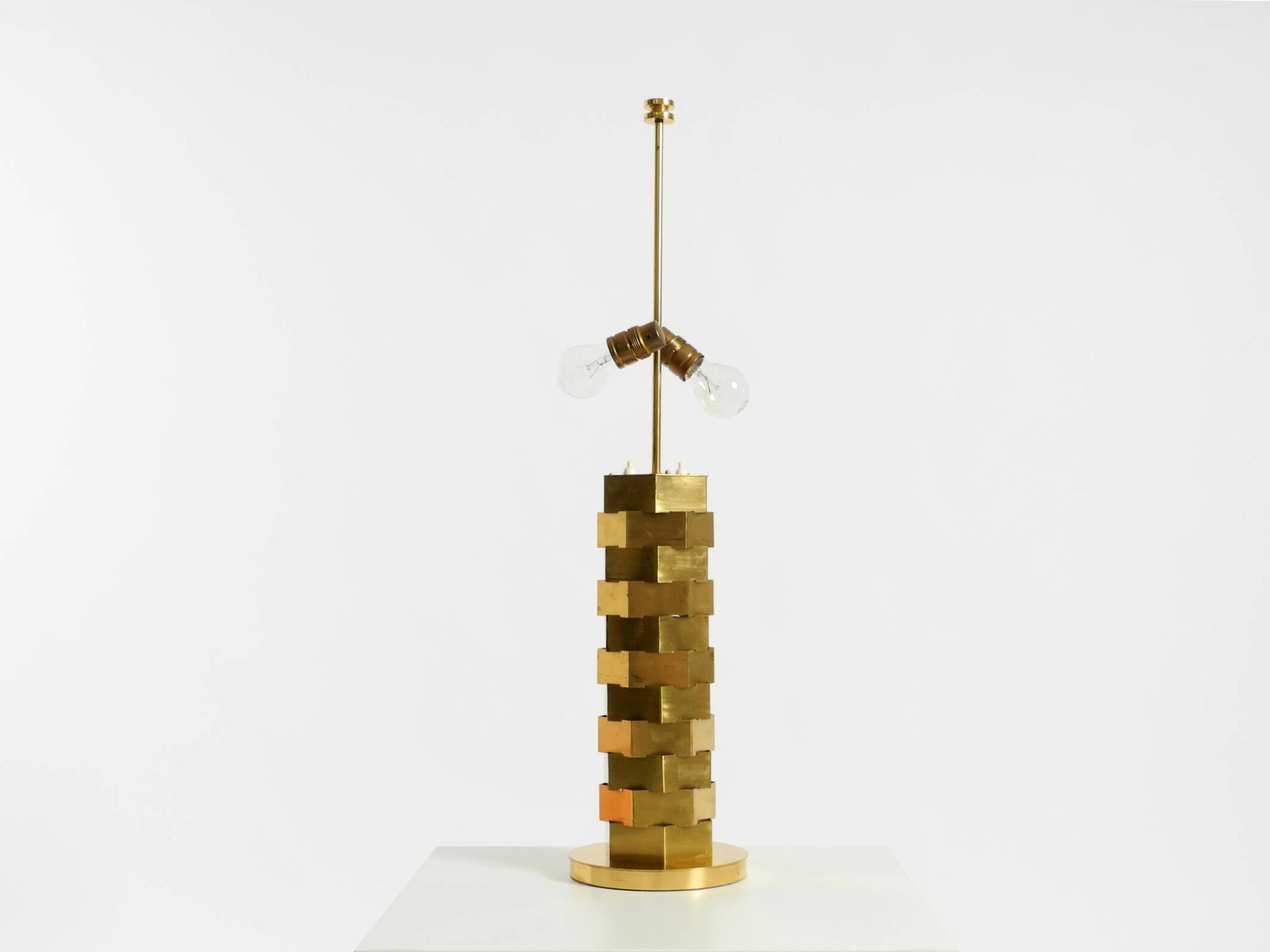 1960s brass table lamp by Vereinigte Werkstätten with an illuminated base