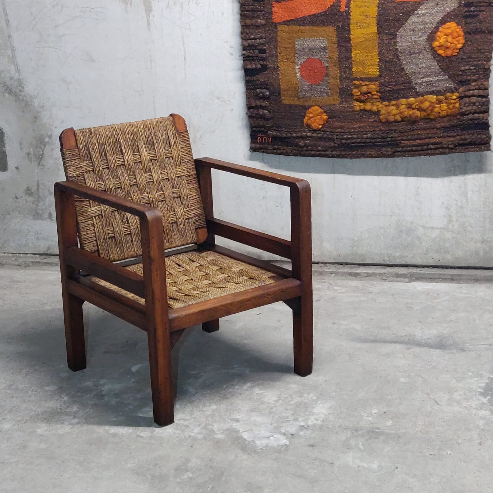 Wooden and rope armchair