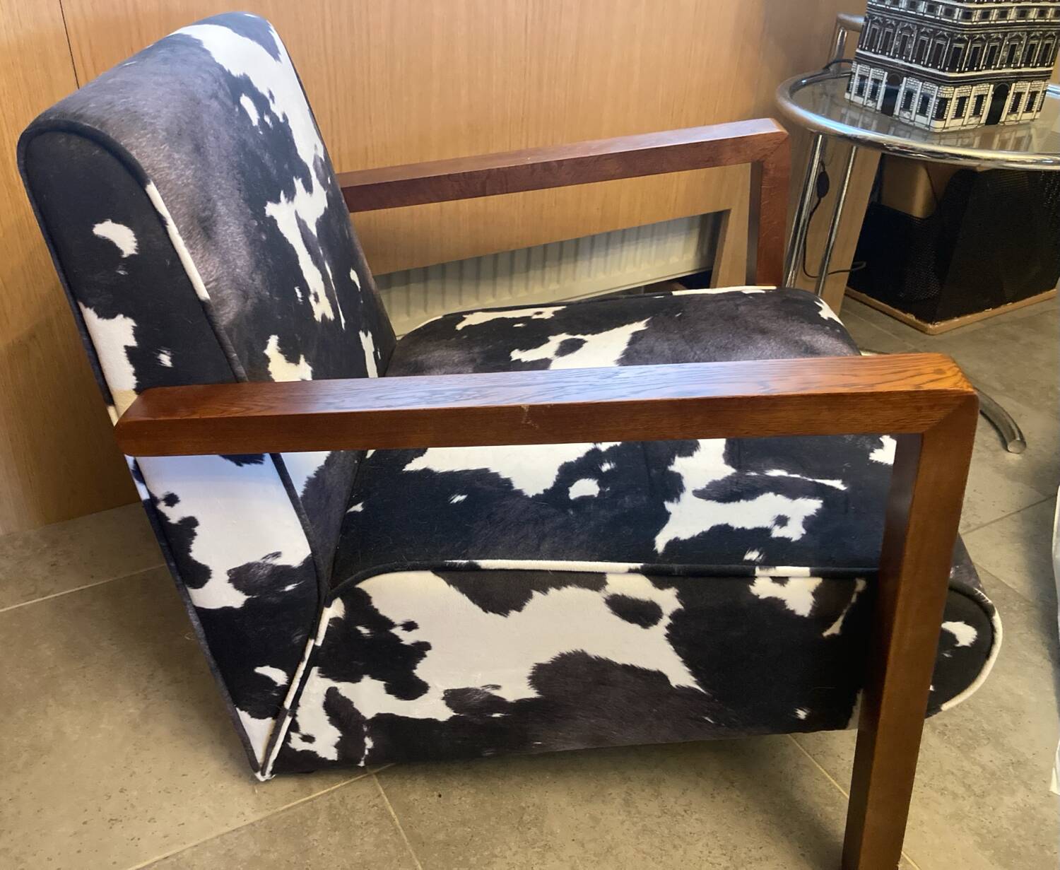Armchair in walnut and animal print velvet