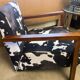 Armchair in walnut and animal print velvet