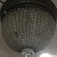 Bronze basket chandelier and tassels
