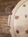 Plat rond Ø26 cm fleurs porcelaine de Limoges