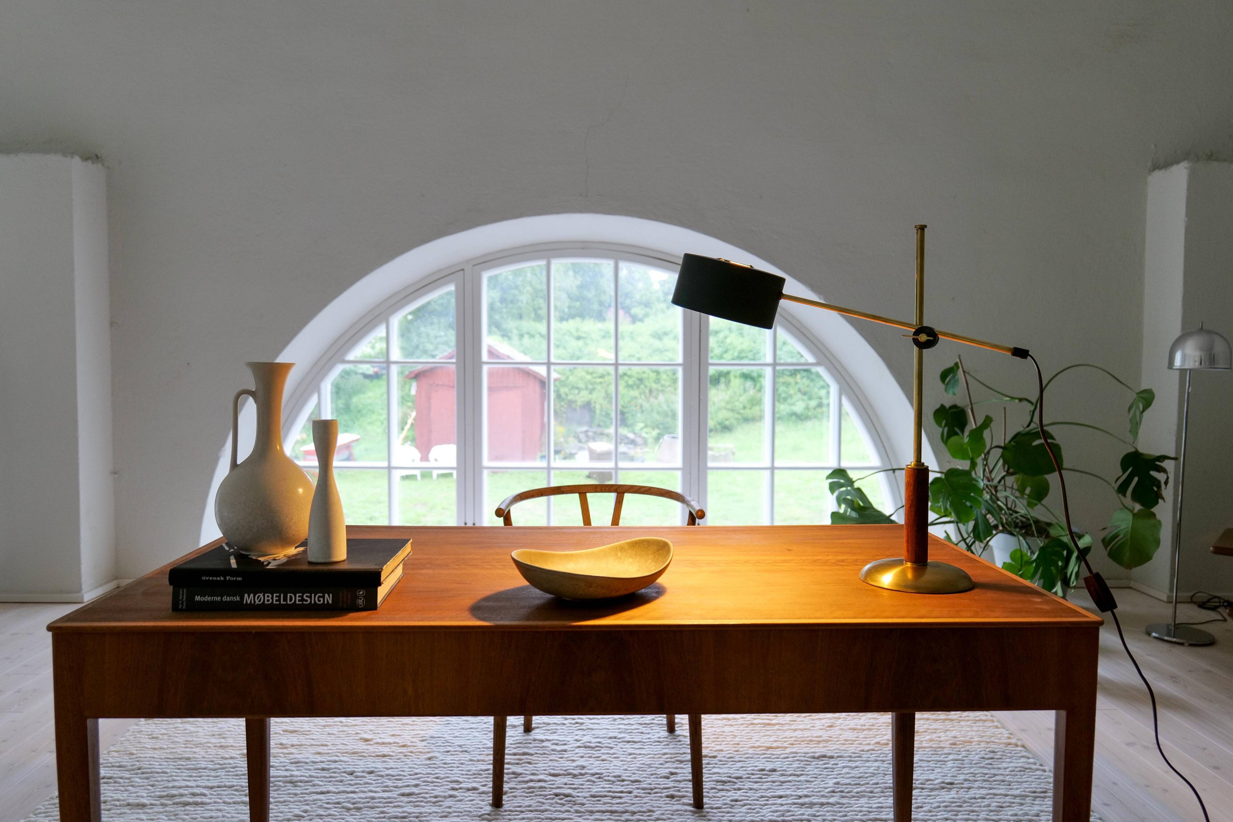 Mid-century modern table lamp in brass and walnut, rare by Einar Bäckström, Sweden.