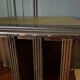 Bibliotheque tournante en acajou anglaise XXe pieds griffes cuir vert