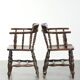 Set of two wooden English antique captain chairs from the late 19th century