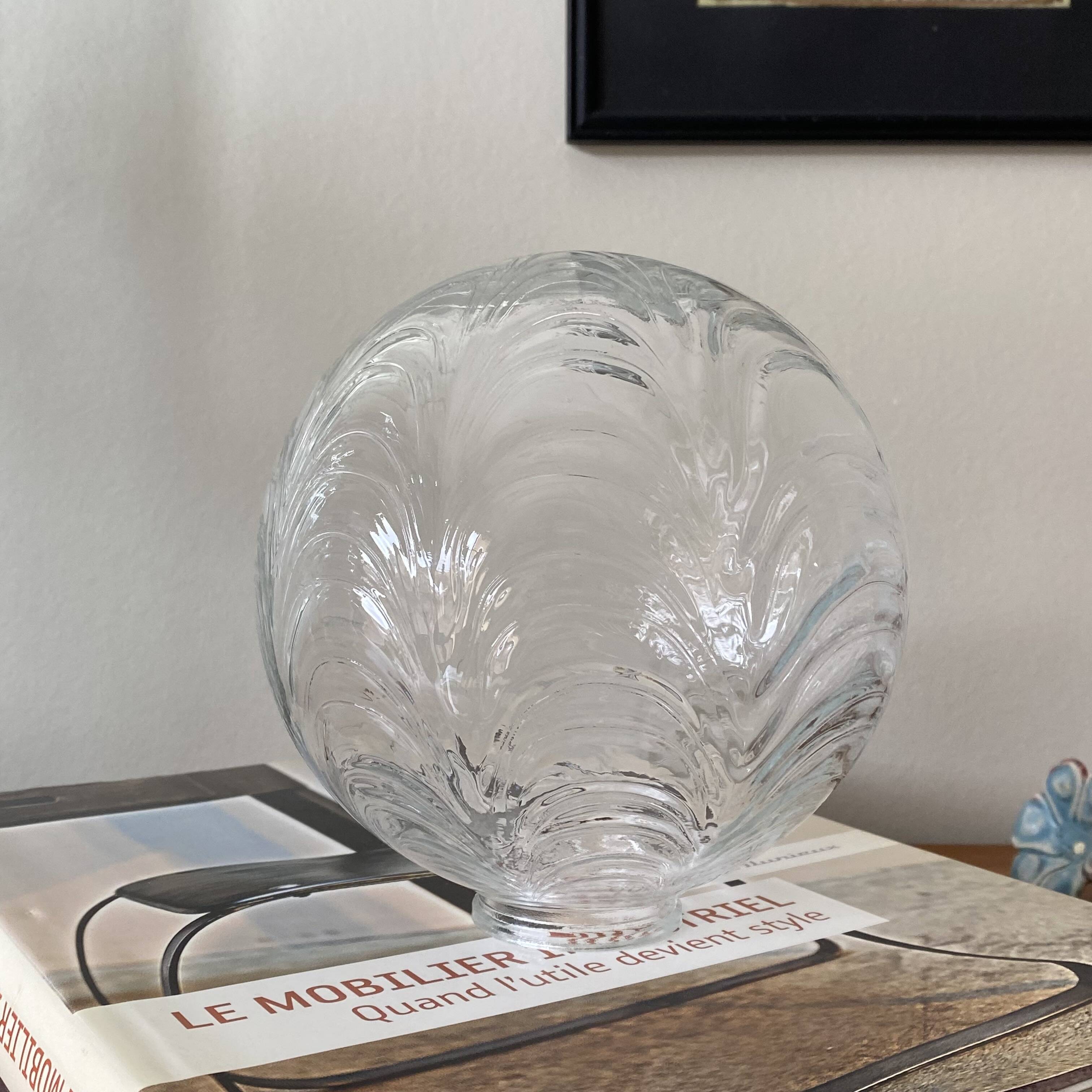 Old transparent glass globe for wall lamp chandelier.
