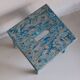 Blue patinated farm stool