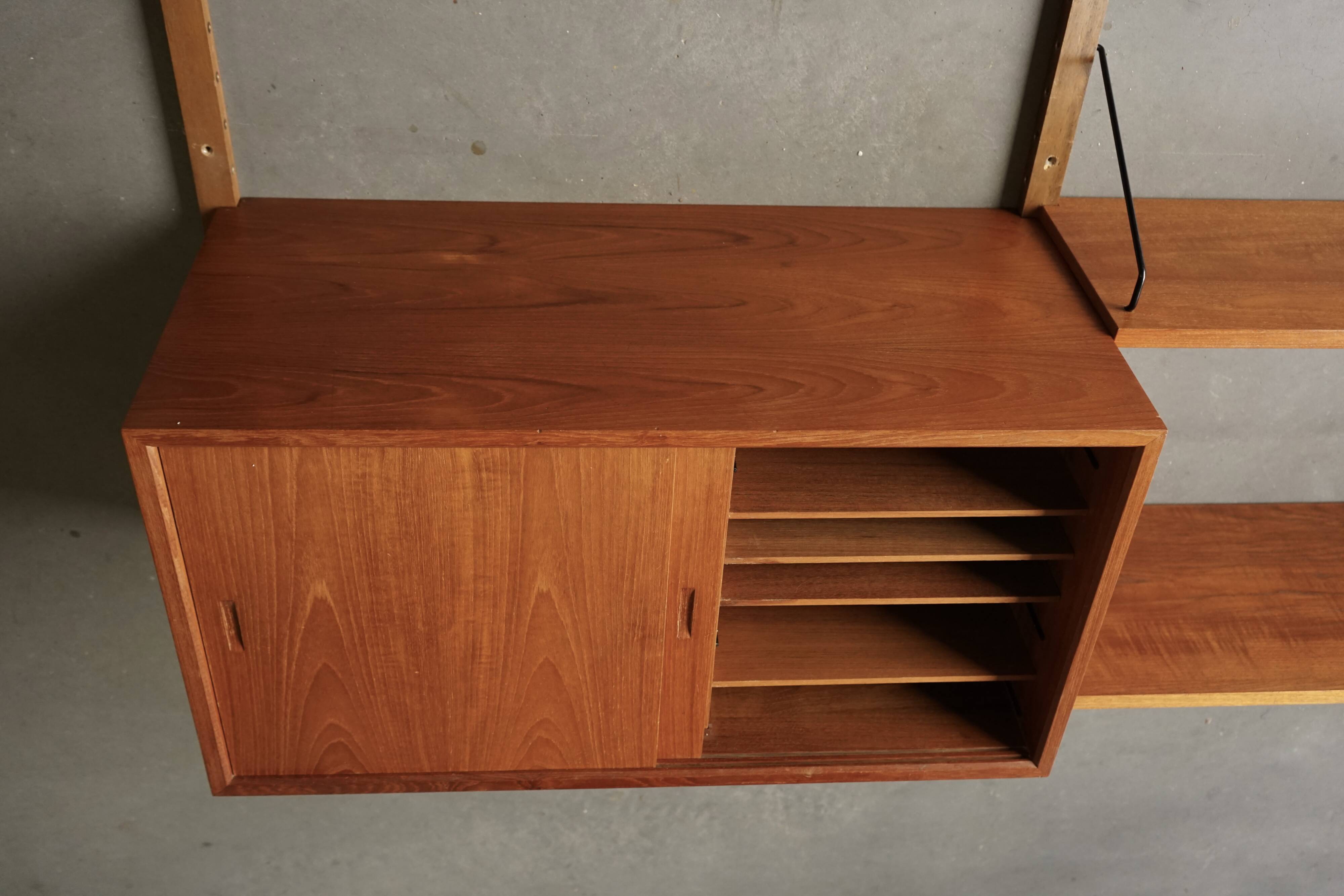 Meuble mural en teck danois du milieu du siècle par Poul Cadovius pour Cado