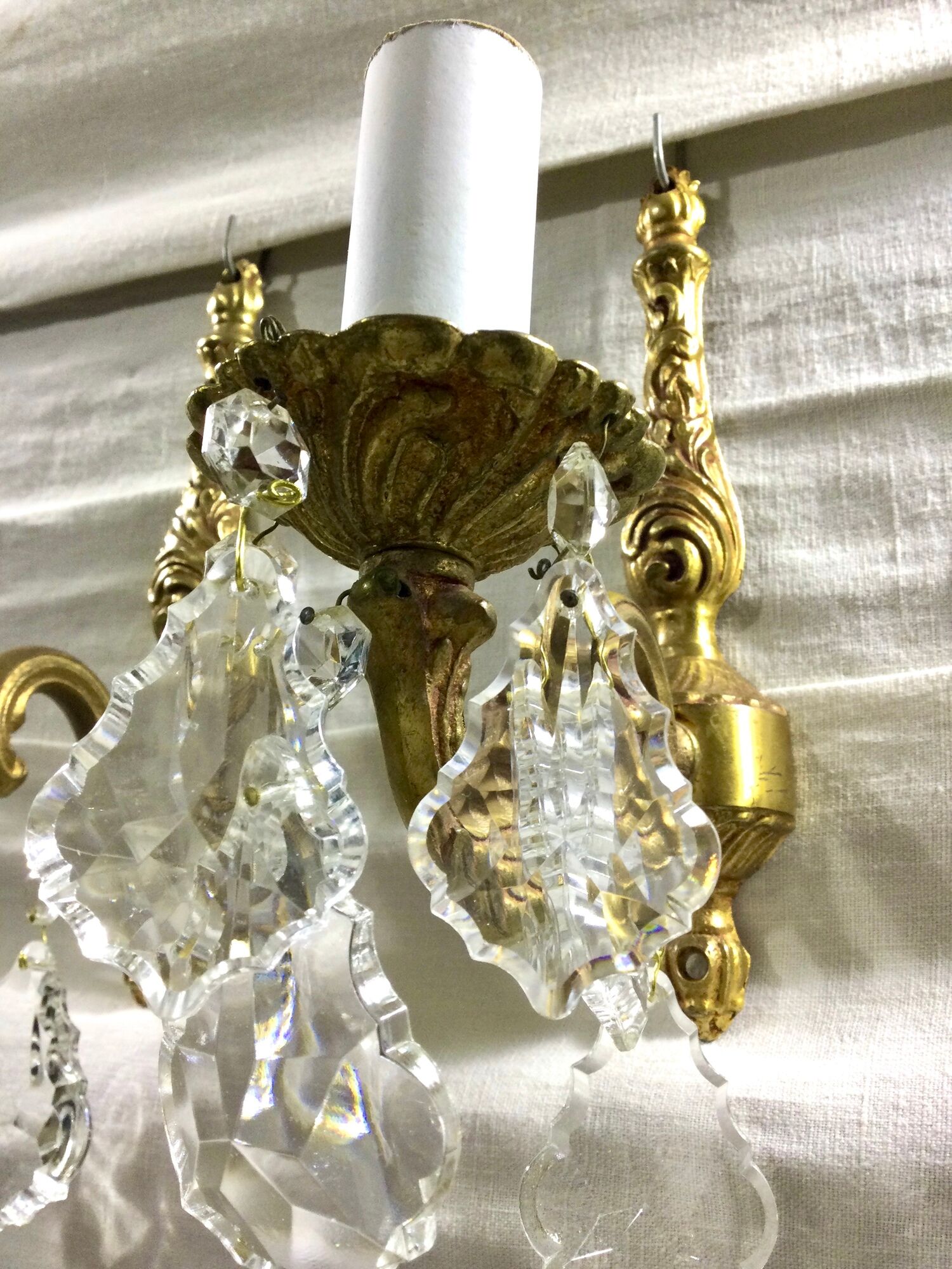 Pair of 1-light bronze sconces and Louis XV style stamps