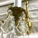Pair of 1-light bronze sconces and Louis XV style stamps