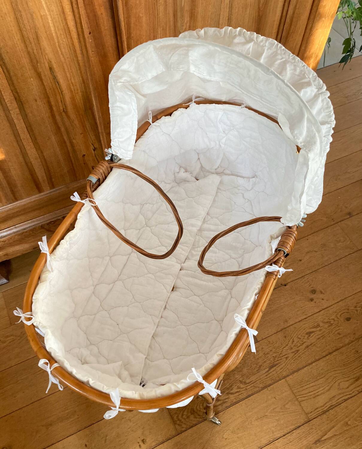 Bamboo, rattan, wicker cradle bassinet from the 1960s with a foldable support.