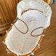 Bamboo, rattan, wicker cradle bassinet from the 1960s with a foldable support.