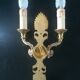 Paire d'appliques style Empire en bronze doré