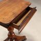 Small antique wooden table with drawer, Italy, 19th century.