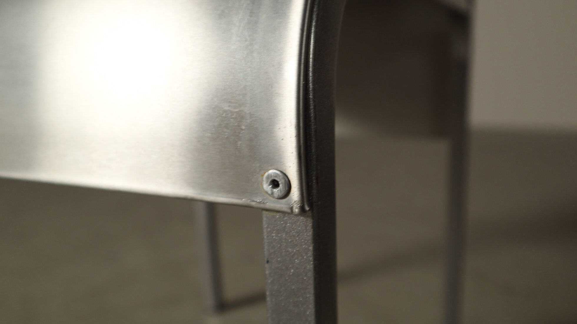 Set of six postmodernist stainless steel dining chairs from circa 1980-1990.