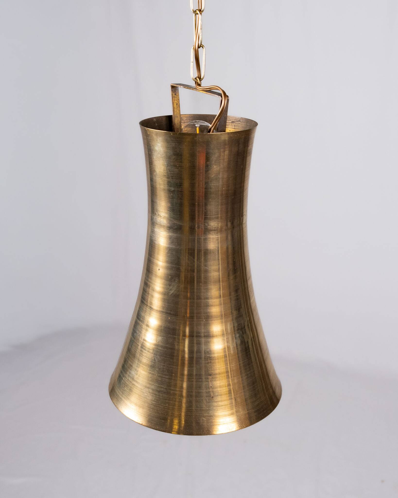 Pair of brass pendants, hourglass shape, 1960s