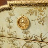 Empire style chest of drawers in lacquer, bronze and marble. Nineteenth century.