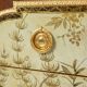 Empire style chest of drawers in lacquer, bronze and marble. Nineteenth century.