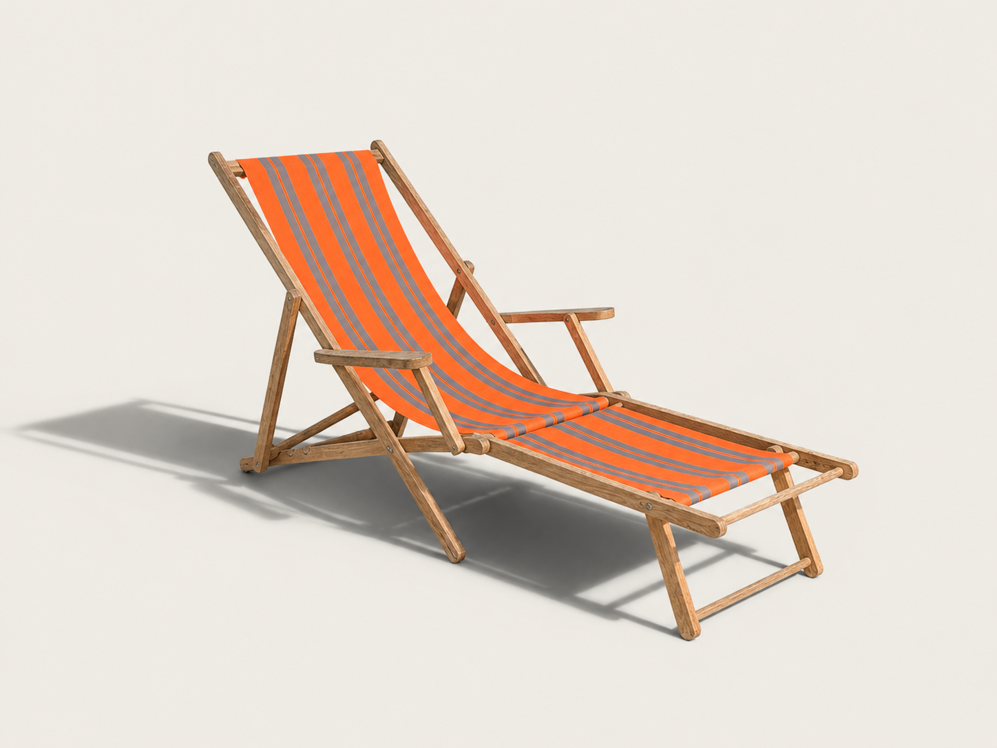 Vintage deck chair with orange and grey striped fabric, original patina.