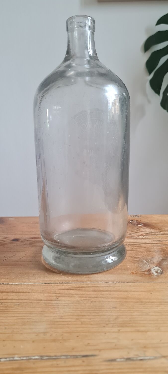 Bouteille ancienne en verre soufflé