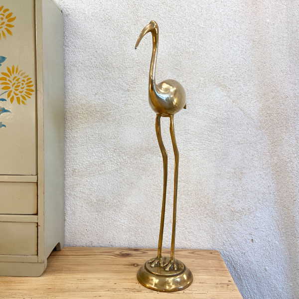 Ibis or heron in gilded brass