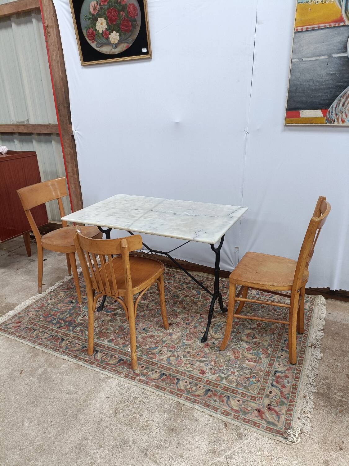 Bistro table with cast iron legs and marble top