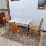 Bistro table with cast iron legs and marble top