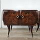 Mid-century mahogany bedside tables with mirrored tops.