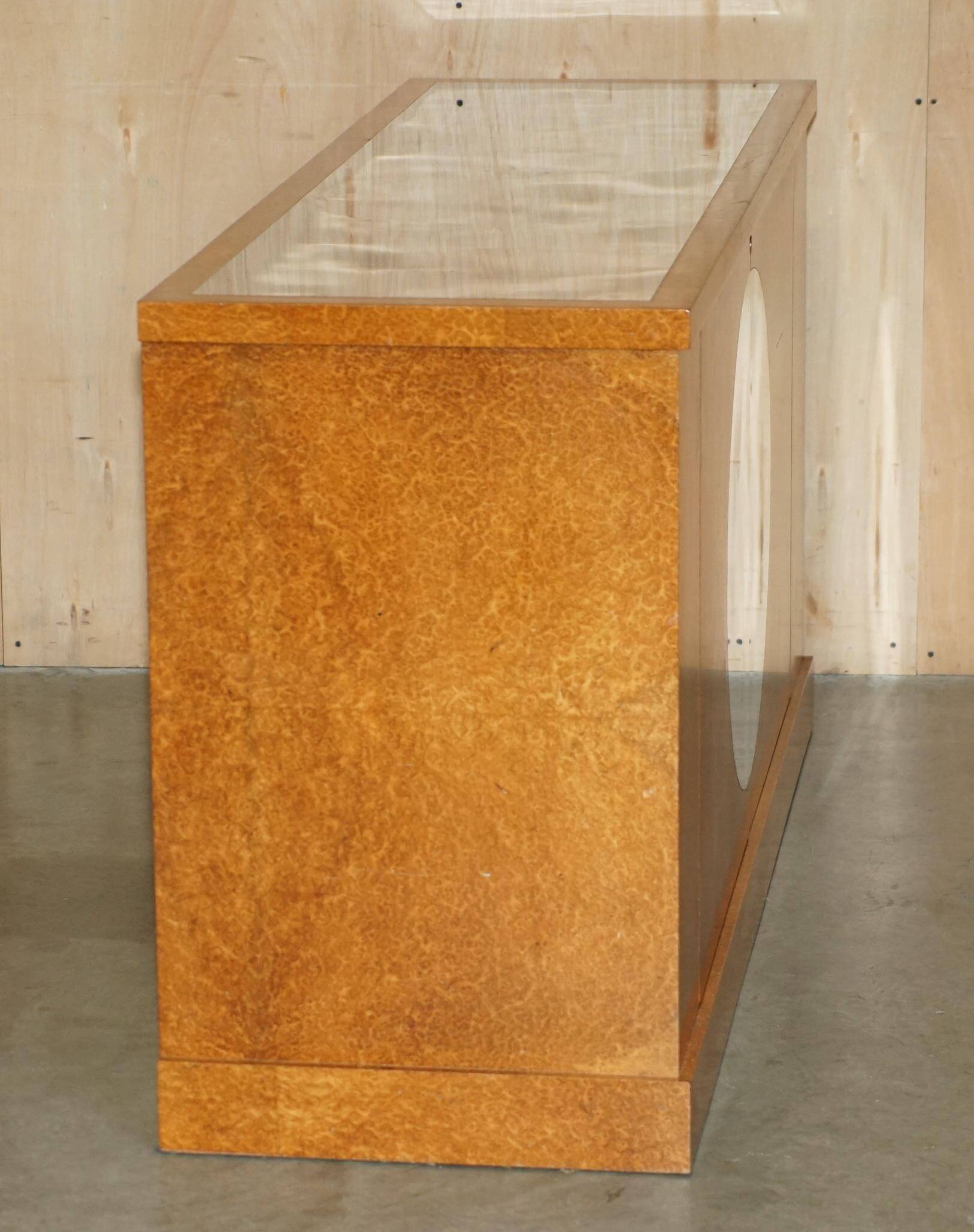 Soane Britain buffet for Bentley in Amboyna burl wood and polished metal.